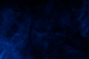 Blue steam on a black background.