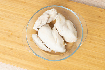 boiled chicken breast on the table closeup