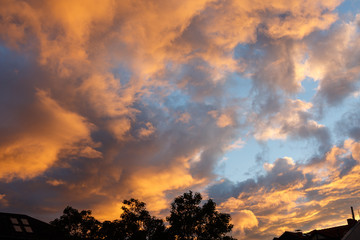 Fototapeta na wymiar Sunset with dramatic sky and clouds