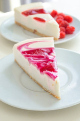 Raspberry cake and many fresh raspberries