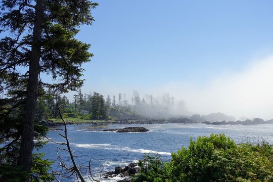 Beautiful day with misty seascape views of the rocky shoreline on the outside coast of Ucluelet facing the Pacific Ocean.