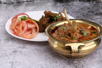 Bhuna Gosht Mutton masala OR Indian Lamb masala and mutton curry Served with onion over moody...