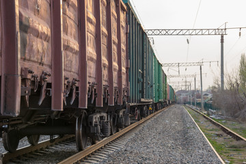 Fototapeta na wymiar freight train moves during sunset.