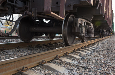 freight train moves during sunset.