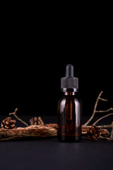Obraz na płótnie Canvas composition with glass bottle of body care organic cosmetics on tree bark pedestal Cosmetic background mock up for product presentation.