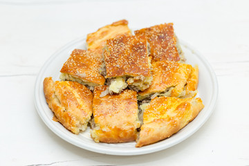 meat pie on a white table