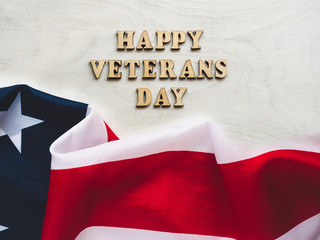 Fototapeta na wymiar Happy Veterans Day. Beautiful greeting card. Close-up, view from above. National holiday concept. Congratulations for family, relatives, friends and colleagues