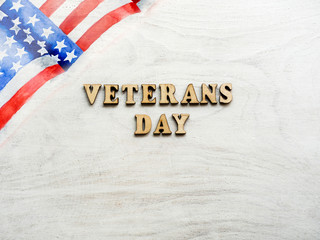 Fototapeta na wymiar Happy Veterans Day. Beautiful greeting card. Close-up, view from above. National holiday concept. Congratulations for family, relatives, friends and colleagues