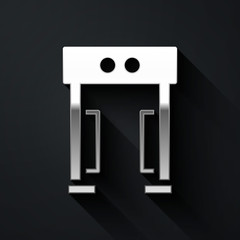 Silver Metal detector icon isolated on black background. Airport security guard on metal detector check point. Long shadow style. Vector.