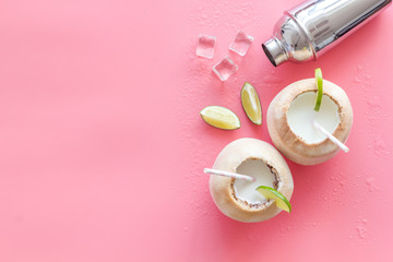 Tropical drink - coconut cocktail Margaritas or Pinacolada with ice and shaker