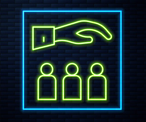 Glowing neon line Boss with employee icon isolated on brick wall background. Vector.