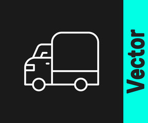 White line Delivery cargo truck vehicle icon isolated on black background. Vector.