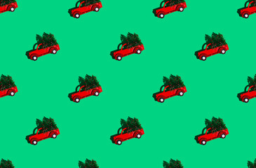 Minimal pattern background of red cars with green Christmas trees on green background.