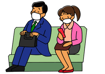 通勤電車内のマスクをしている乗客