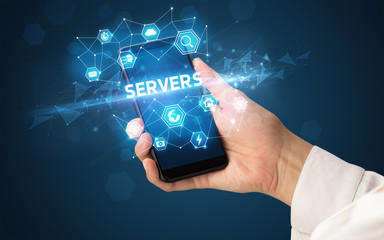 Female hand holding smartphone with SERVERS inscription, modern technology concept