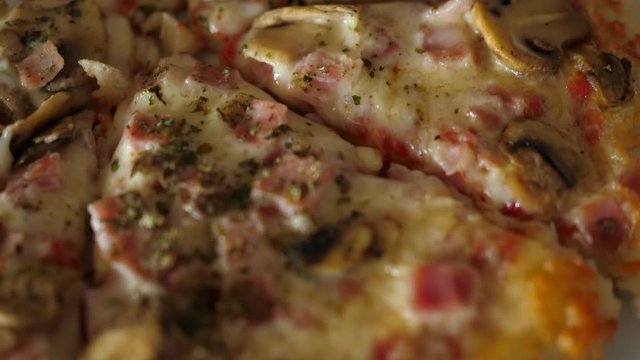 Pizza capricciosa macro closeup cheese ham mushrooms
