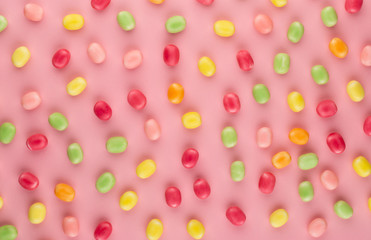 Small round candy-colored pastels on pastel background.