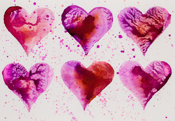 Watercolor painted pink heart, on the white watercolor paper.