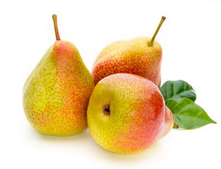 Fresh bio pear with leaves on isolated white background.