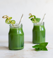 Green smoothie. Glass. The concept of a healthy lifestyle.