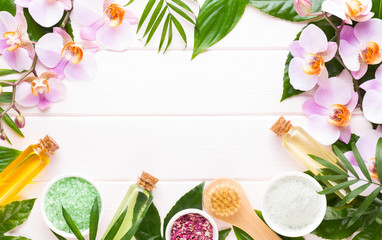 Beauty and fashion concept with spa set on pastel rustic wooden background.