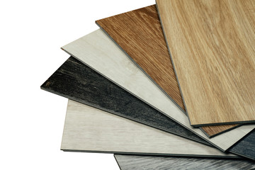 Laminate background. Samples of laminate or parquet with a pattern and wood texture for flooring and interior design. Production of wooden floors