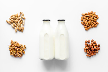 Above view of non-dairy milk alternative - almond hazelnut walnut milk