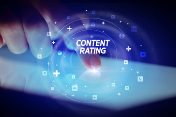 Finger touching tablet with social media icons and CONTENT RATING
