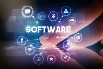 Finger touching tablet with web technology icons and SOFTWARE inscription, web technology concept