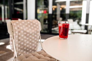 Refreshing red lemonade on the white table