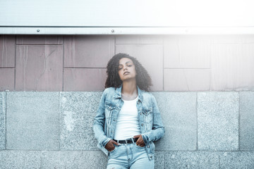 black curly girl on street