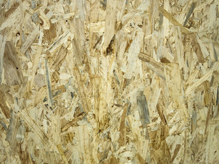 wooden board bagasse background. Prefabricated plate made of sawdust