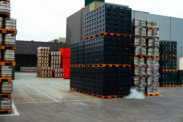 Germany Brewery. Pallets of beer kegs in stock outdoor brewery