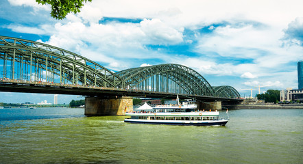 Cologne, Germany - June 2019: Bridge Rhine river and boat view