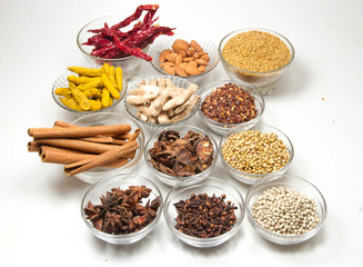 Aromatic spices on wooden spoons. Food ingradients.

