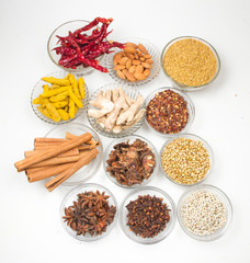Aromatic spices on wooden spoons. Food ingradients.

