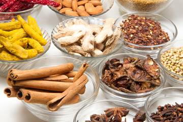 Aromatic spices on wooden spoons. Food ingradients.

