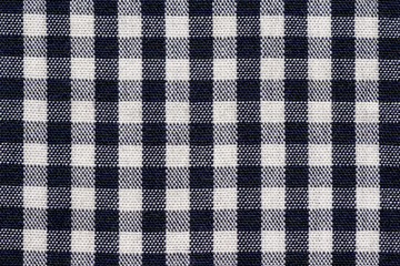 Plaid checkered cotton fabric texture background.	