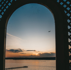 Beautiful view of the sunset in the sky from the window. Natural background.