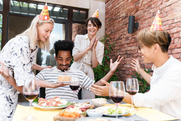 Group of friends celebrating birthday