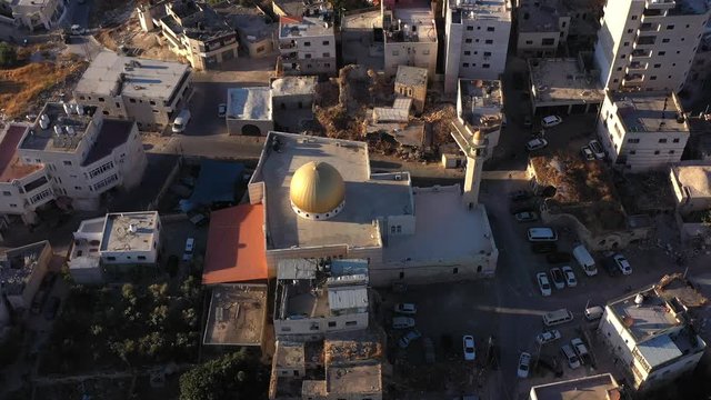 Golden Dome Mosue in Anata refugees Camp, Palestine,Israel, Aerial
Drone view, August, 2020, Sunset
