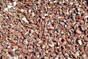 Drainage systems from small pebbles. Garden drainage for plants and trees. Red stones for roads and...
