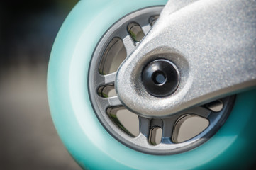 Close up of inline roller skates with blue wheels. Extreme sport. Concept about sport and leisure....