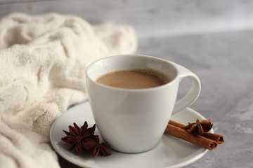 Obraz na płótnie Canvas cup of coffee drink with cinnamon sticks and star anise