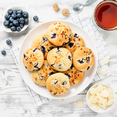 Blueberry Muffin Cookies on white wooden background.