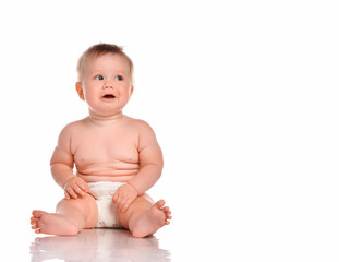 One baby boy with funny cute expression isolated on white.