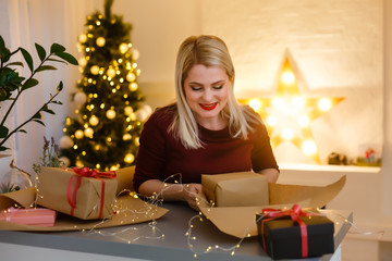 Obraz na płótnie Canvas Closeup on table where woman making Christmas decorations. Upper view