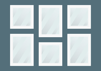 Picture or photo frames on the wall. Modern empty framework blanks design. Vector illustration.