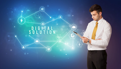 Businessman in front of cloud service icons with DIGITAL SOLUTION inscription, modern technology concept