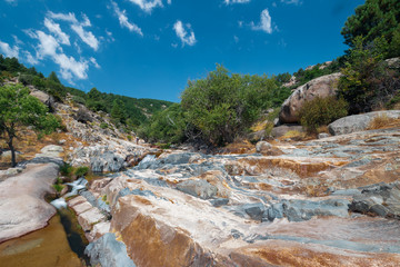 La Pedriza National Park on the southern slopes of the Guadarrama mountain range in Madrid, with cascades. It is one of the largest granitic ranges. It has amazing nature and plenty of leisure options